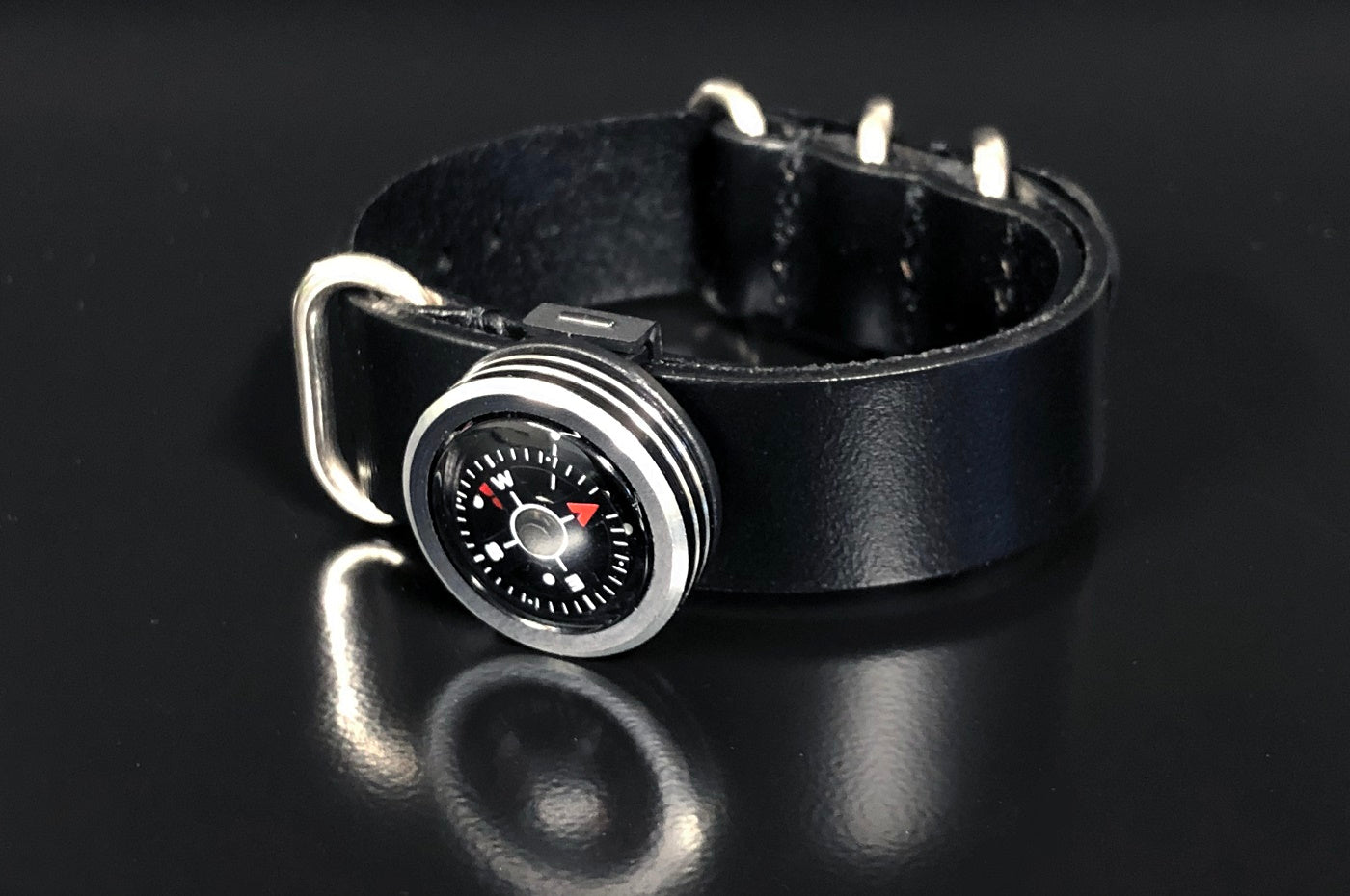 Aluminum Wrist Compass - Black Leather, on black table