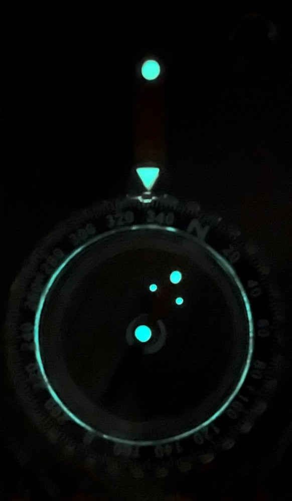 Treknor map compass glowing in the dark